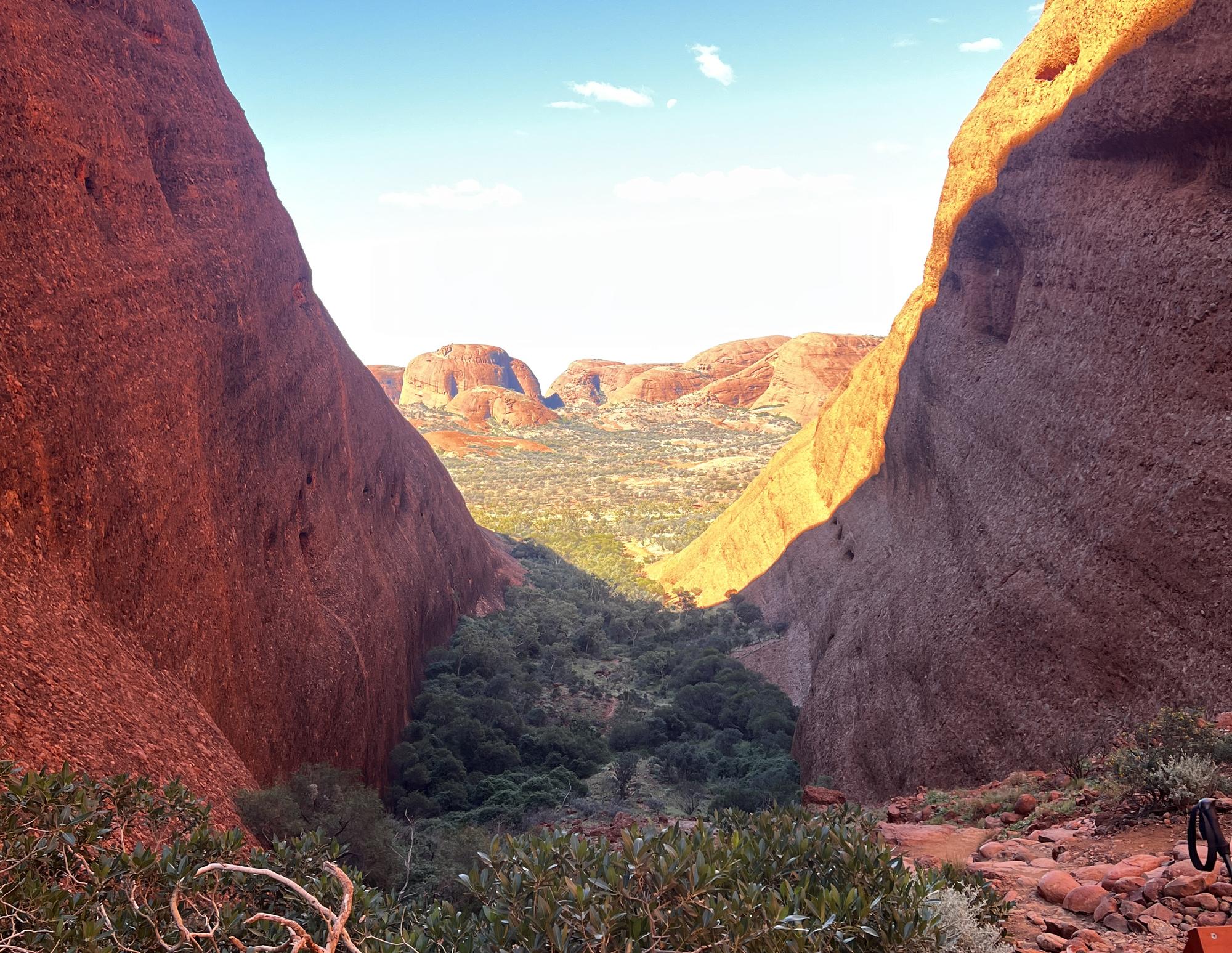 A route opening between rock walls